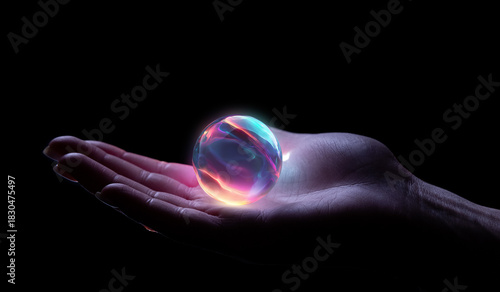 Tableau sur toile Hand holding glowing holographic sphere hovering above palm