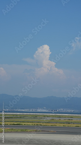 One airport view with the summer sky as background
