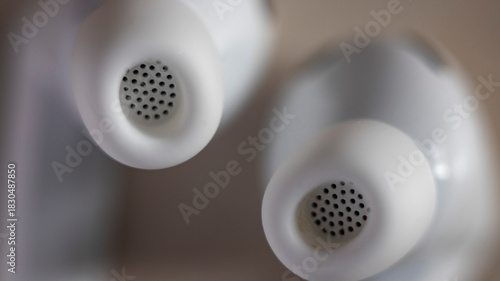 Tableau sur toile White earbuds: close-up of sound outlet perforations