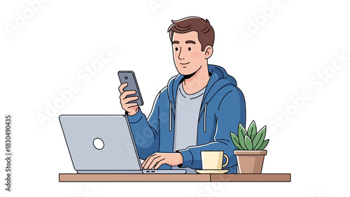 Man working on laptop while using phone at his desk