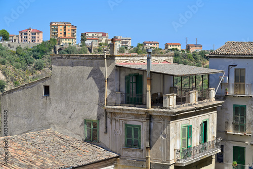 Obraz na plátne Rossano old town residential buildings with green shutters