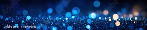 A vibrant blue background with shimmering lights, resembling a starry night or sparkling water surface.