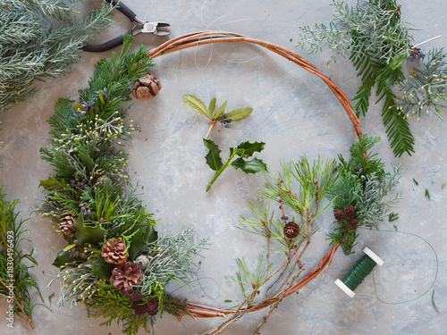Christmas wreath in the process of being handmade