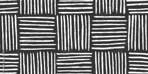 Black and white hand drawn brush stroke pattern with intersecting lines abstract background