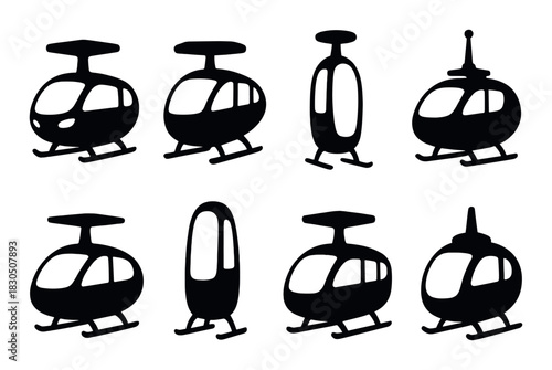 Set of eight black helicopter silhouettes on a dark background