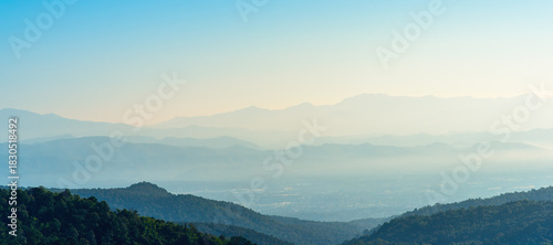 Landscape of mountains range with morning frog for mountain background.