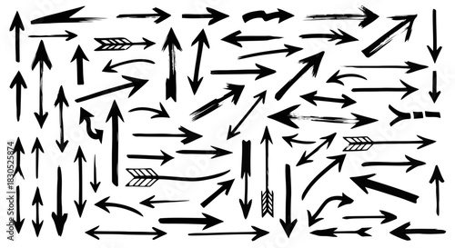 Abstract black and white arrows pointing in various directions on a