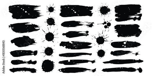 Grungy black ink brush strokes and splatter set for artistic design elements