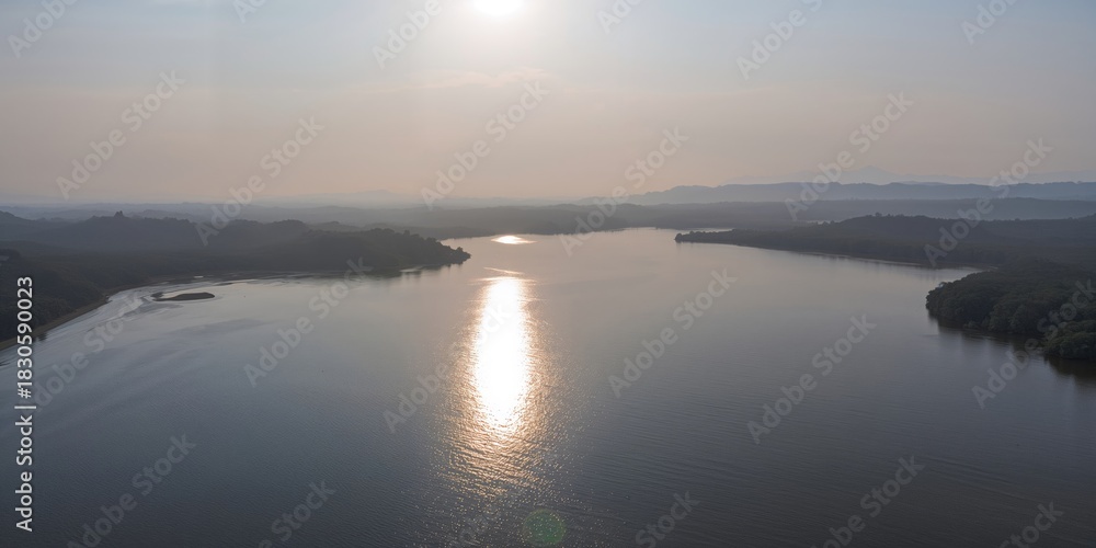 Fototapeta premium Vibrant modern orange velvet chair against natural wooden background, suitable for interior decor display