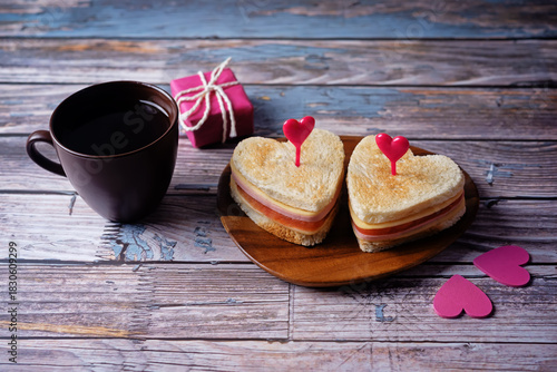 Ham tomato and cheese canape sandwiches in the form of heart for Valentine's day holidays