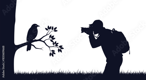 Dark silhouette of a wildlife photographer with a camera and backpack taking a picture of a bird on a leafy tree branch.