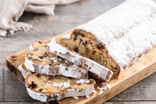 Traditional Christmas Stollen with Raisins and Powdered Sugar on christmas