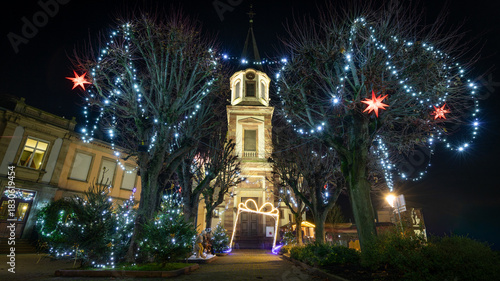 Beautiful decoration and Christmas market at night in Reichstett in France on November 28th 2025