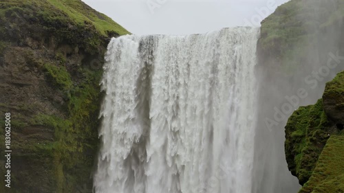 Skogafoss Waterfall Close Up with Mossy Cliffs Iceland