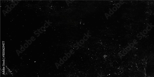 Abstract dark cosmos texture with black ink splash and white dust particles across the night sky