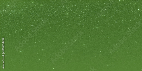 Old, dirty, textured window surface with rain drops and a blurred green background pattern