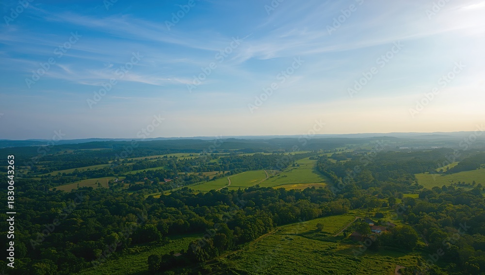 Obraz premium Green Land aerial drone shot, emphasizing seasonal plant growth and landscape preservation