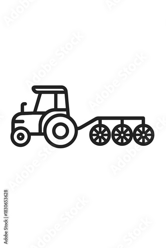 Farm tractor pulling heavy machinery for soil cultivation and planting