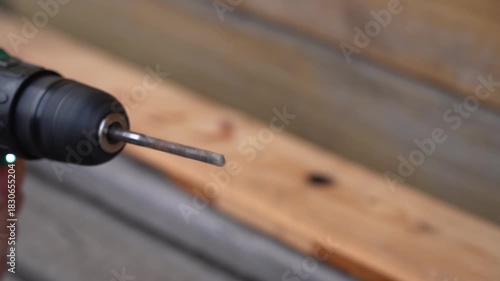 A Close-Up of a Power Drill with a Twist Drill Bit Ready for Action, Focused on Precision, Efficiency, and Home Improvement Projects. Video with sound