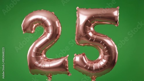 Rose gold foil balloons forming the number 25. Birthday or anniversary party celebration decoration. Isolated on a green screen background for chroma key