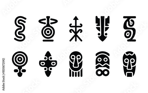 Collection of tribal symbols and masks in black silhouette