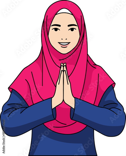Smiling young Muslim woman in a vibrant pink hijab making a traditional respectful greeting gesture.