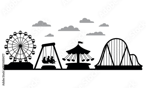 Silhouette amusement park with rides and clouds against white