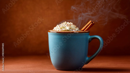 A steaming mug of delicious rice pudding with cinnamon sticks.