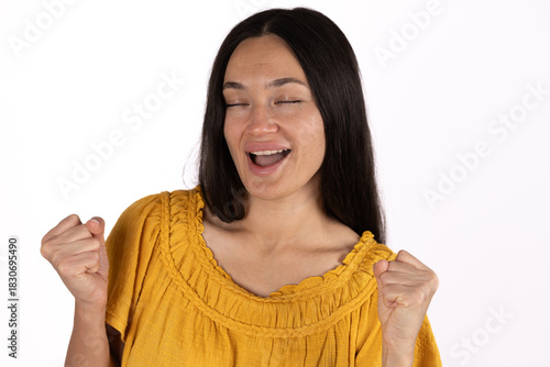 Woman gasping in astonishment, eyes wide, mouth agape