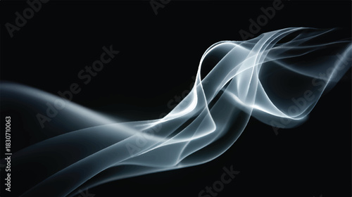 Elegant flowing smoke trails against a stark black background studio shot