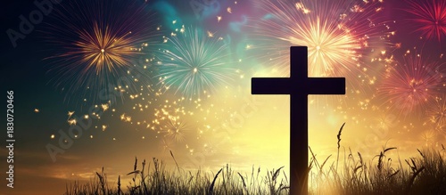 Christian Cross Silhouette Against Sunset Sky with Vibrant Fireworks, Representing Faith, Hope, and Celebration.