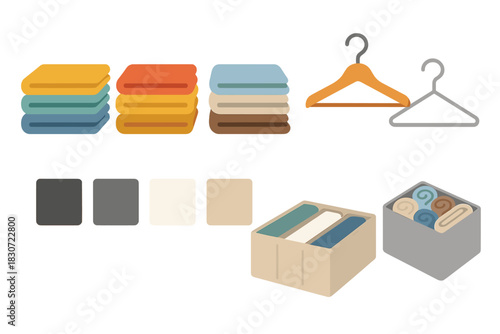 Set of home organization items including folded laundry, towels, storage boxes, and hangers