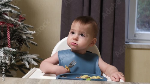 Baby Feeding Time by the Christmas Tree