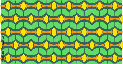 Green and yellow seamless pattern with rounded interlocking shapes forming a lively geometric design.