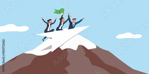 Business team celebrates reaching mountain peak on paper airplane
