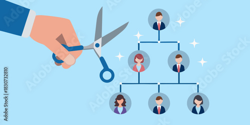 Hand with scissors cutting organizational chart reducing staff