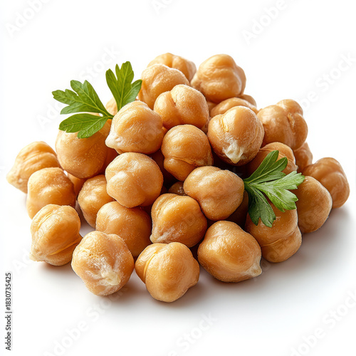 Pile of fresh uncooked chickpeas with parsley sprigs on a white background.