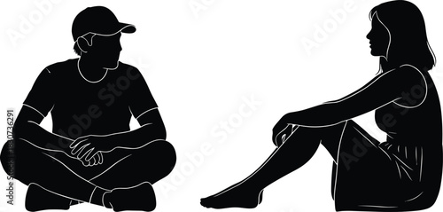 Silhouette of man and woman sitting on ground facing each other, casual conversation concept, communication, relationship, interaction, people discussing outdoors