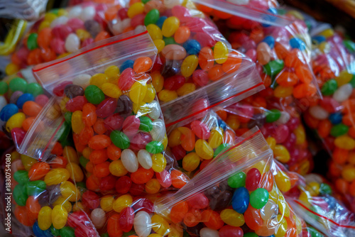 Colorful jelly beans packed in plastic zipper bags