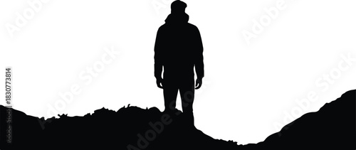 Silhouette of a person standing on a rocky ridge vector