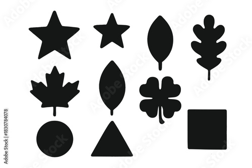 Simple black silhouettes featuring stars, leaves, clover, and basic geometric shapes