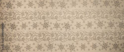 Vintage snowflake and floral stripe pattern on kraft paper
