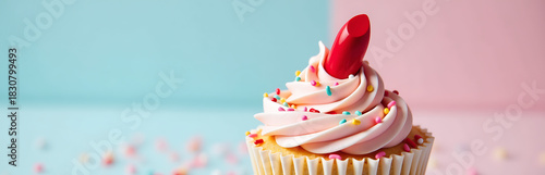 vibrant shot bright red lipstick placed top swirled frosting surrounded tiny multicolored cake