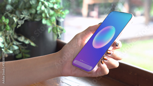 Woman using phone voice assistant AI chatbot app to ask for help with home work task and questions. artificial intelligence LLM chat customer service support, smart virtual speech technology concept