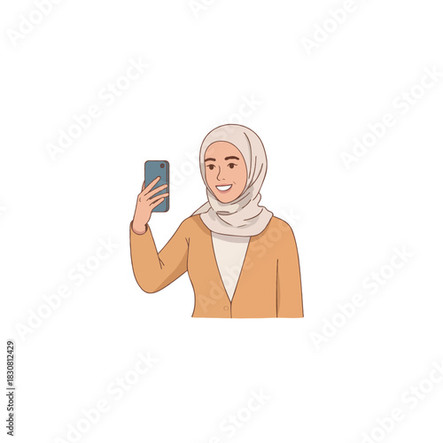 Smiling muslim woman taking self portrait with smartphone depicting contemporary digital age