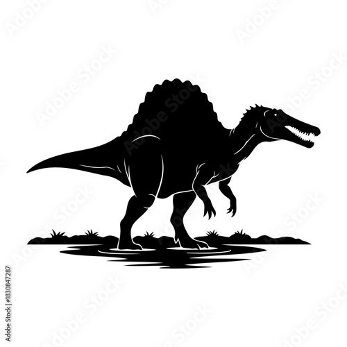 Black silhouette of a spinosaurus dinosaur standing on a grassy surface