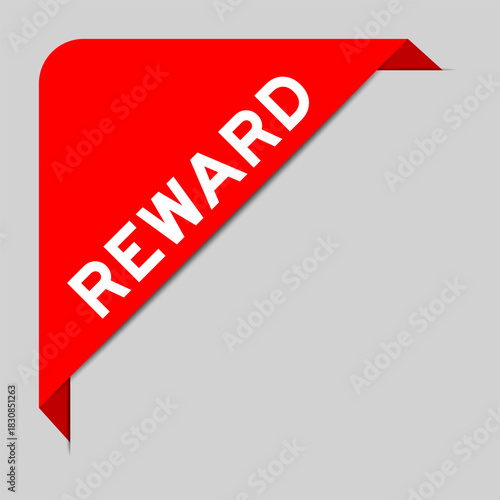 Red color of corner label banner with word reward on gray background