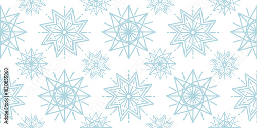 Soft pastel blue star shaped snowflakes arranged in seamless winter pattern on white background, ideal for textiles, wrapping paper, and festive prints
