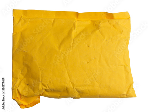 Crumpled Yellow Packaging Envelope on White Background for Shipping, Mail, and Packaging isolated on a white background
