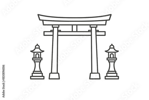 Traditional Japanese Torii gate structure flanked by two stone lanterns